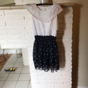 White dress with blue and gold